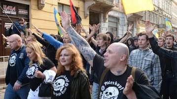 Ilustrační obrázek k Fotografie z neonacistického průvodu nezachycuje pirátskou poslankyni, v době pořízení fotografie jí bylo deset let